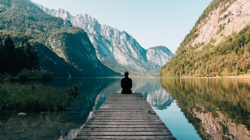 person-on-a-bridge-near-a-lake-7479643451178f8080578b.jpg